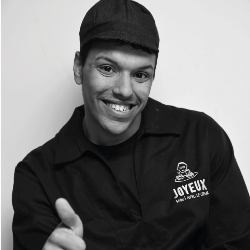 Café Joyeux Bordeaux Florian, cheerful team member welcomes you and serves you with his heart